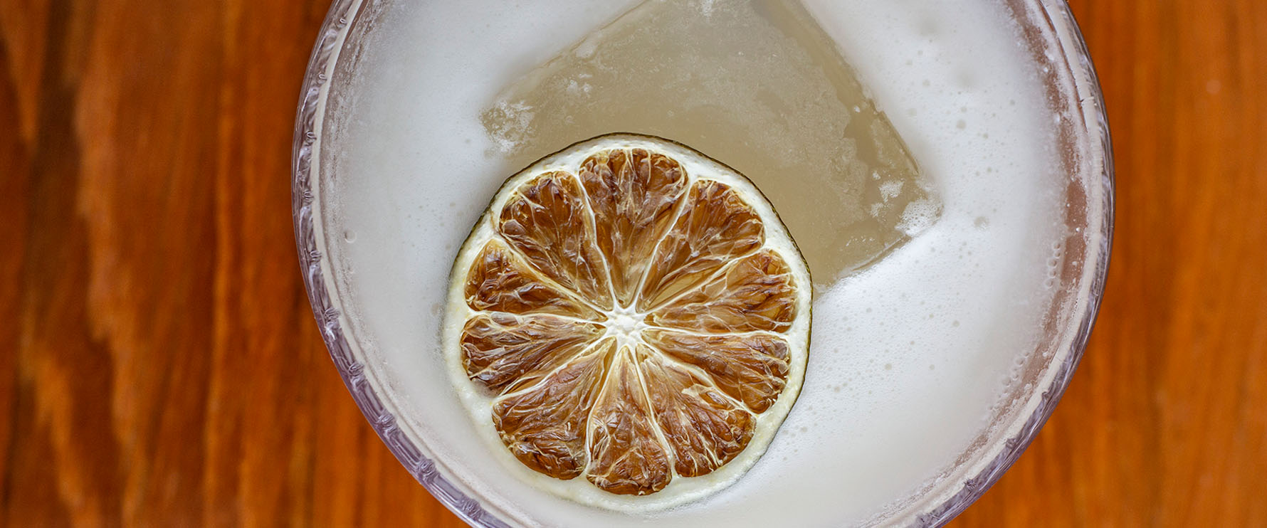 A close up of a cocktail on a table at Del Mar, Naples.